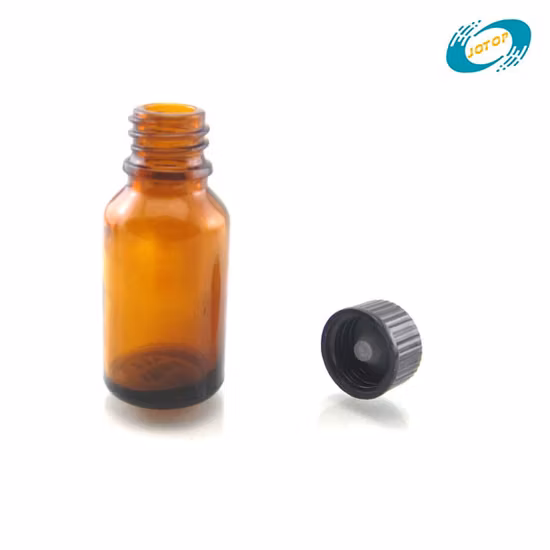 Frascos cuentagotas de vidrio de color ámbar intenso utilizados para llenar aceites esenciales