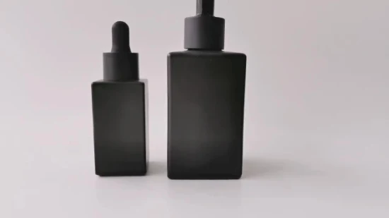 Botellas cuentagotas de vidrio cosmético Empaquetado Aceite esencial de cabello negro mate de lujo Venta al por mayor Vacío 10 ml 15 ml 30 ml 50 ml 100 ml 120 ml Botella de vidrio de perfume esmerilado